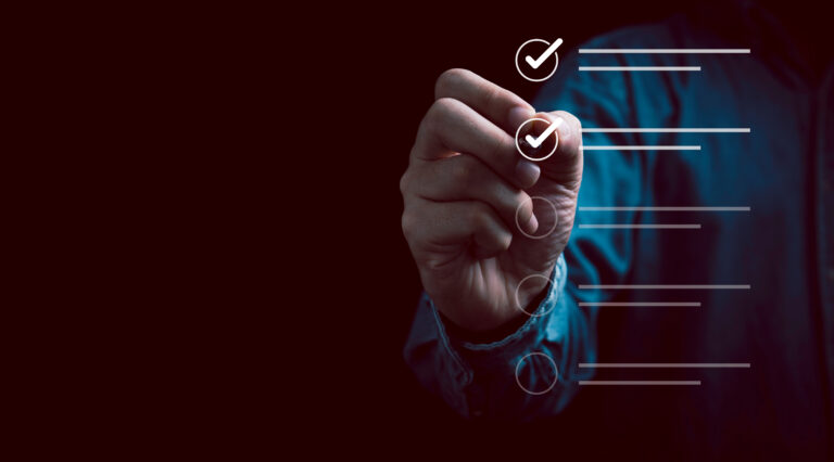 Businessman using pen to tick correct sign mark in checkbox for quality document control checklist and business approve project concept